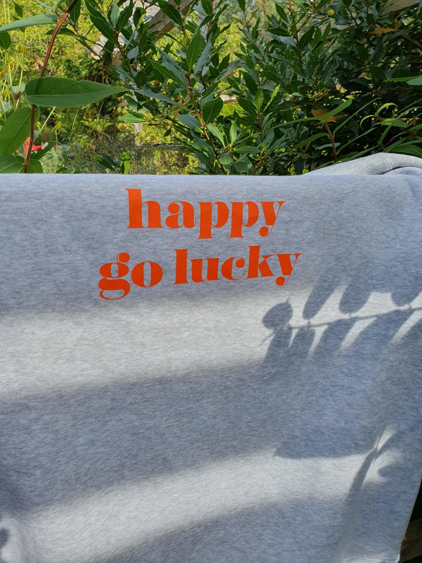 STRANDLIV Sweater "happy go lucky" grau/orange